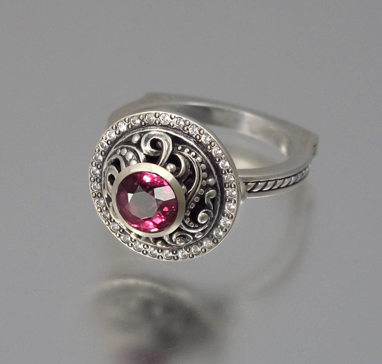 OLGA 14K gold ring with red Tourmaline and diamond halo