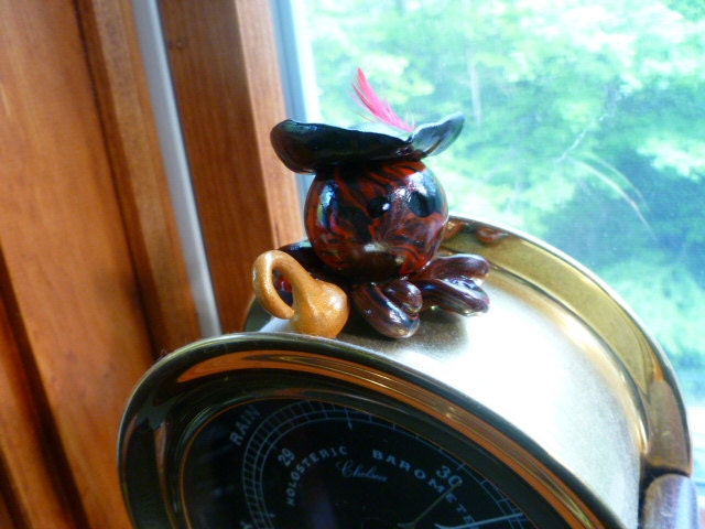 Awesome Little Octopus Pirate Captain in Red and Black Swirl With Painted Eye Patch and Sculpted Hat with Feather Gold Earring and Hook
