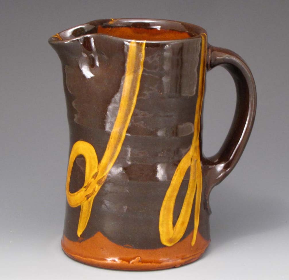 Pitcher Black and Amber Slip Trailed Redware
