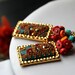 bright shades of  dyed Turquoise  cluster with clay floral gold earrings in hammered brass rectangle frames - When Colors Explode