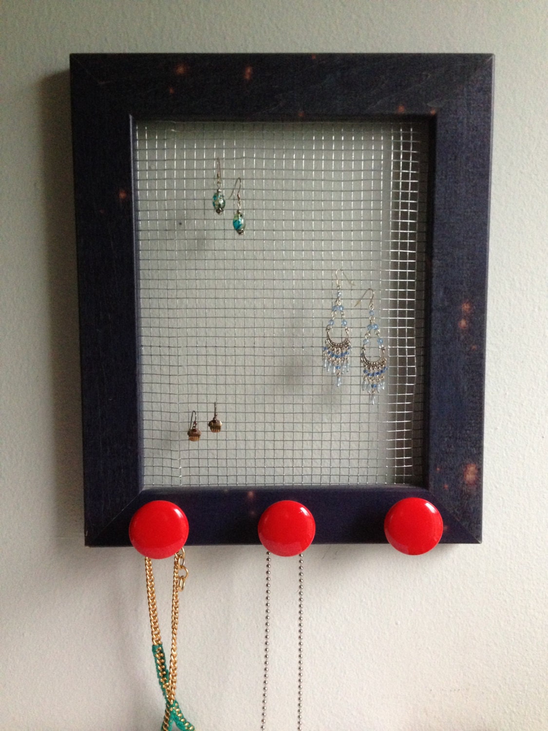 fun and funky - upcycled blue wood frame jewelry holder with bright red ceramic knobs