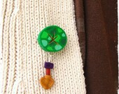 Animal Crossing inspired pin. Digging spot and golden shovel. Polymer clay geek jewelry.