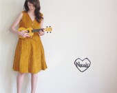 mustard corduroy vest . 1970 folk singer wear .medium.large .disaster relief .sale
