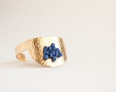 Nudo Half-circle bracelet Brass and Leather knotted