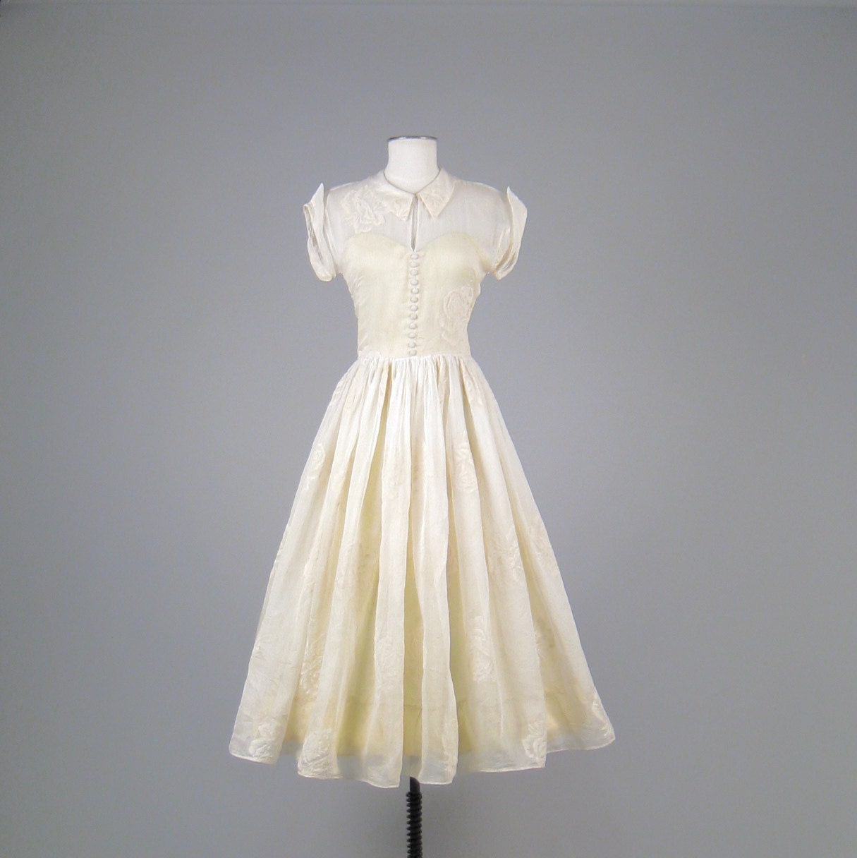 Vintage 1950s ivory sheer wedding dress with flocked rose print