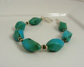 Turquoise twisted stone bracelet with sterling silver