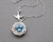 Bird nest necklace, sterling silver chain, flying bird, swarovski crystal pearl color choice, silver wire wrapped nest, three eggs