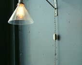 Industrial wall light with deep cone shade