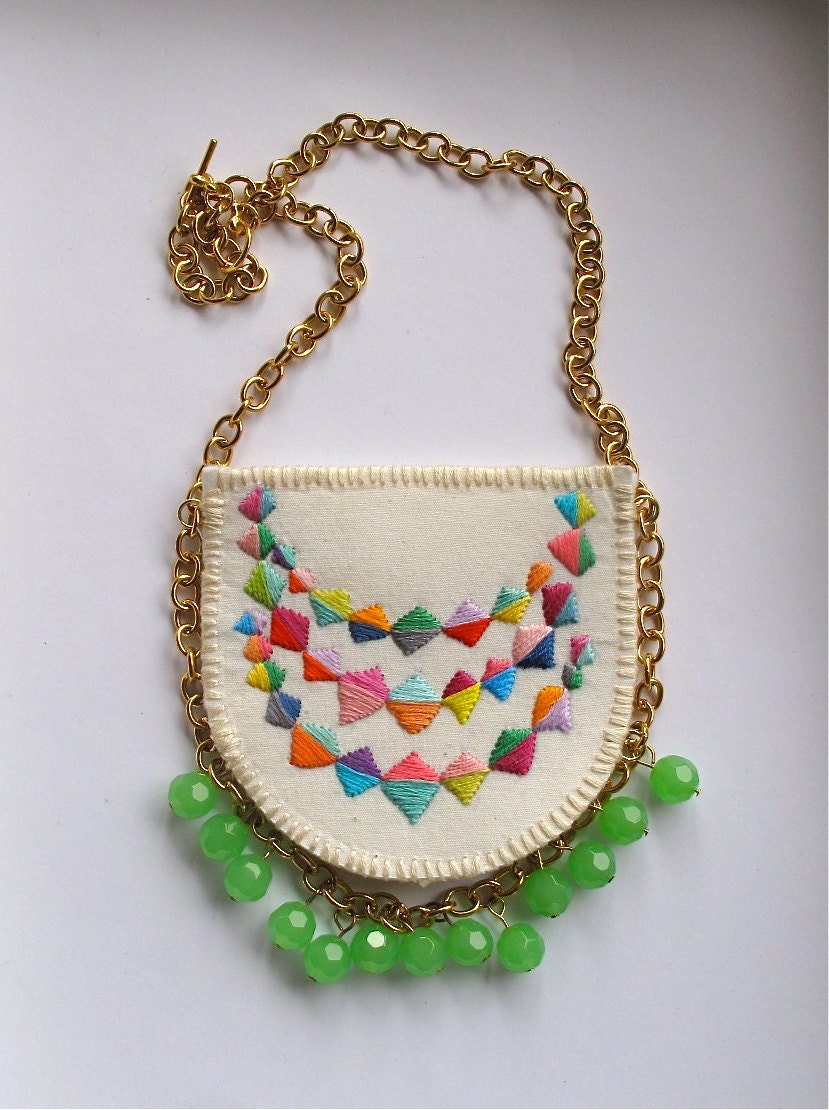 Colorful embroidered necklace with a triple banner triangle design on gold chain with mint green glass beads