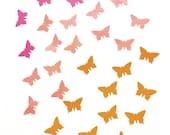 100 handpunched butterflies in the shades of peach