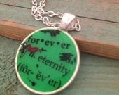 Green pendant necklace with 'forever' quote. Silver  finish. 1 inch