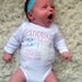 Personalized baby name birth announcement onesie