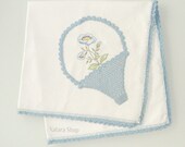 Cotton tablecloth embroidered and crocheted with a flower. handmade