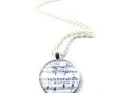 Music necklace, silver necklace with sheet music.
