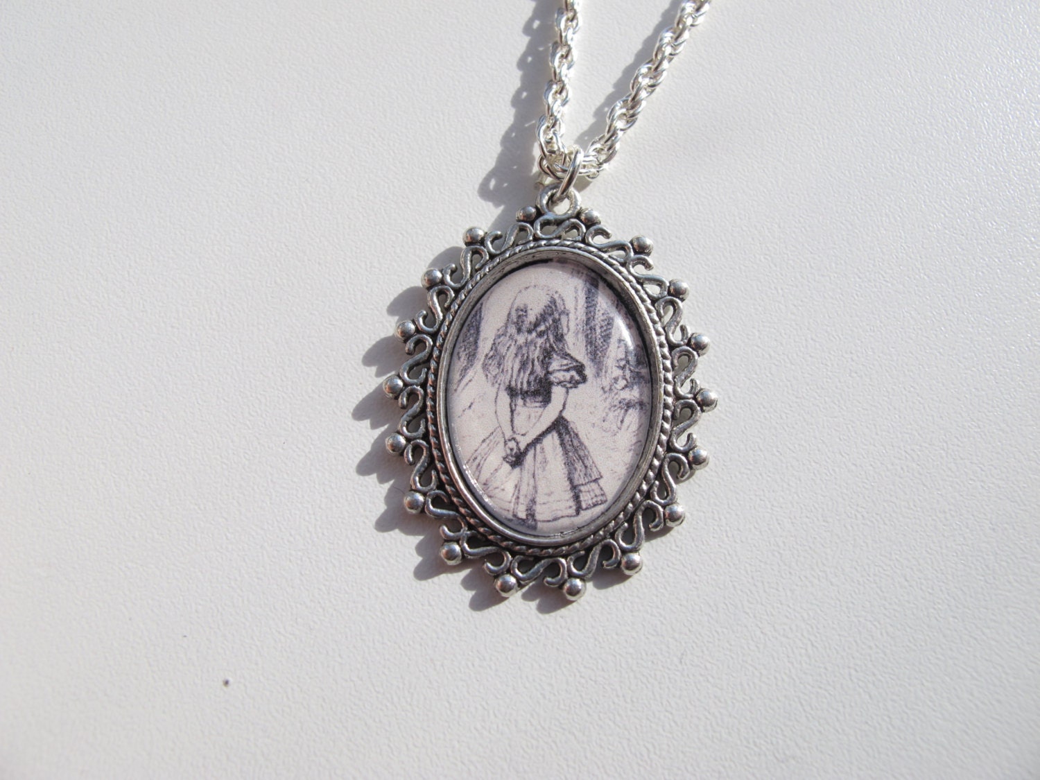 Alice in Wonderland necklace, John Tenniel Illustration in black and white.