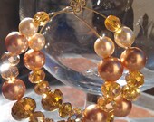 Gold beaded pearl hoop earrings