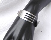 Fork bracelet. Small bended stainless steel fork.