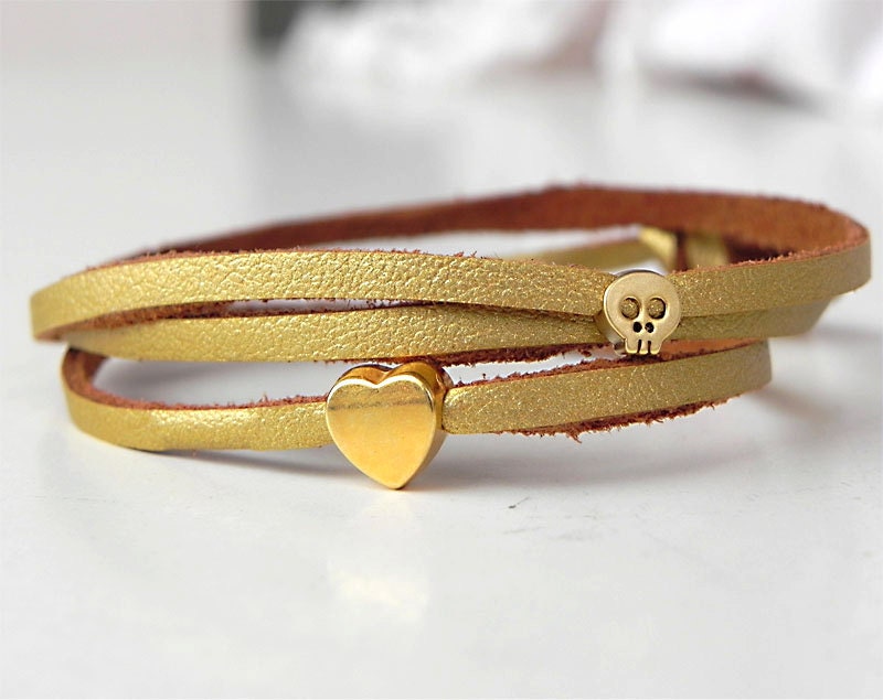 New trendy triple row bracelet with gold plated skull and heart, golden suede cord, minimal modern jewelry
