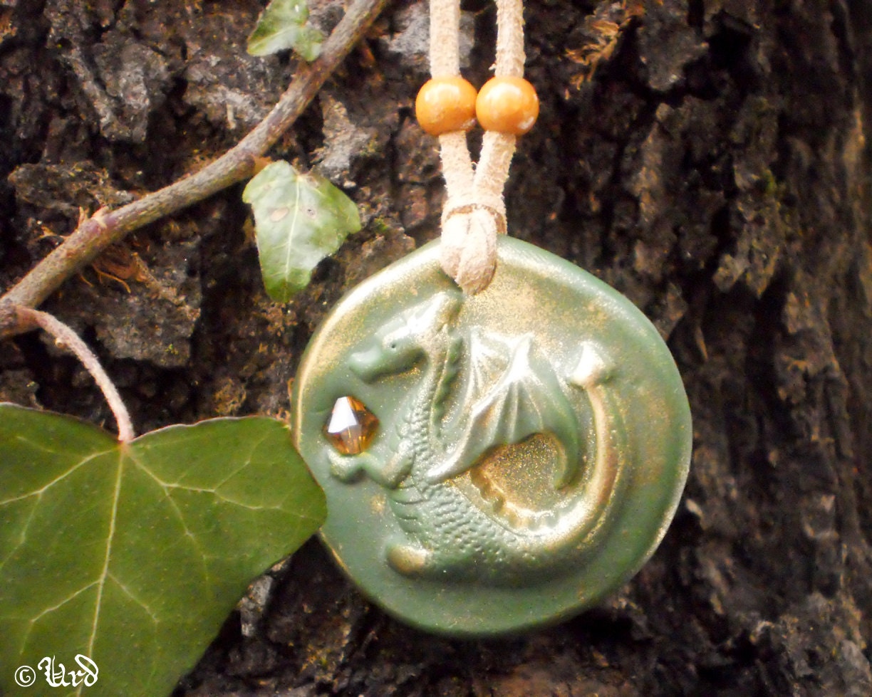 Green and gold dragon medallion with orange Swarovski crystal, polymer clay pendant with golden powder - OOAK fantasy, fairy jewelry