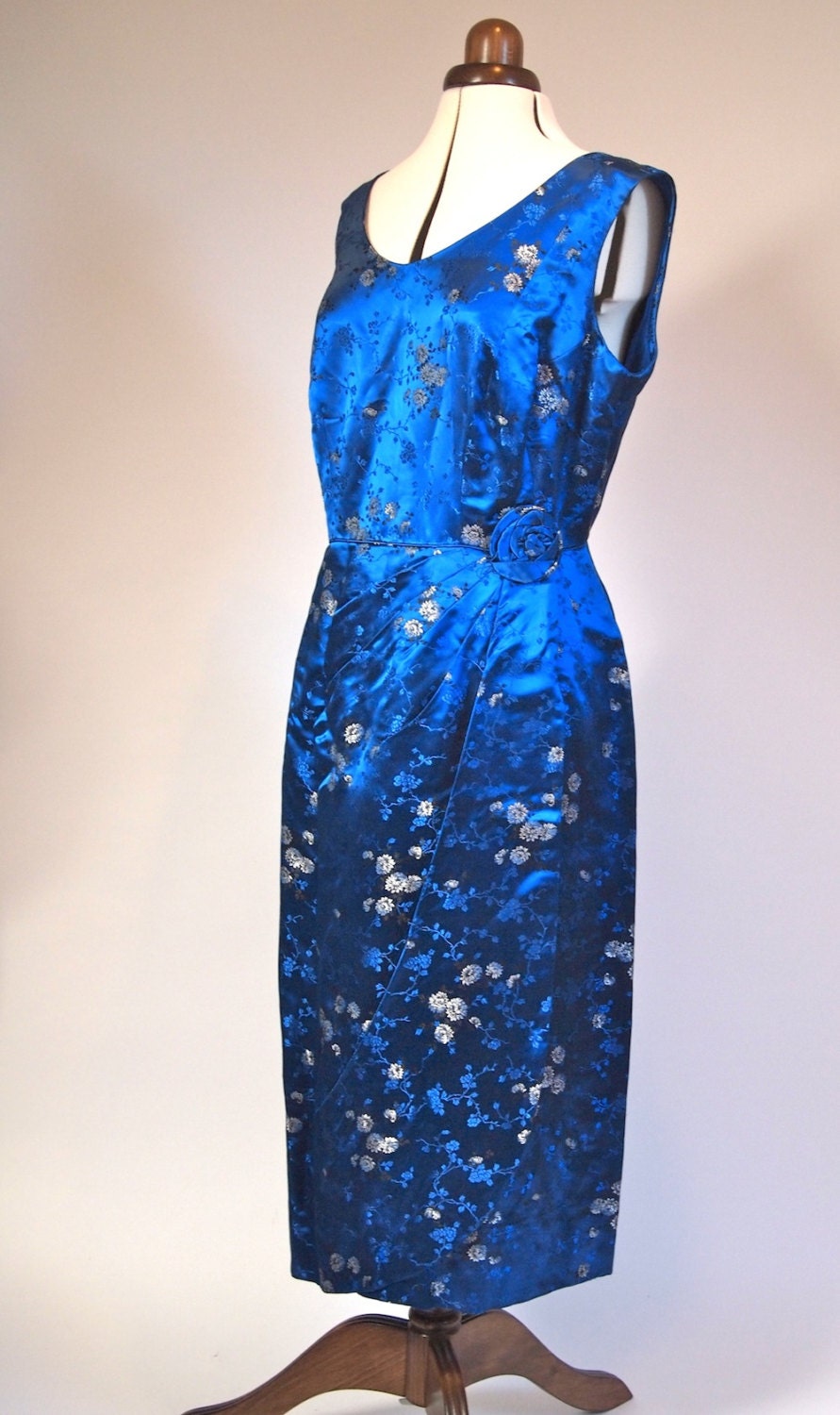 Vintage 1950s royal blue oriental silk evening wiggle dress with silk rose corsage on the waist and wrap around detail on skirt size 16 18