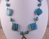 Statement Gothic Turquoise Blue Dyed Howlite Skull and Bronze Colour Wire Work Necklace