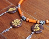 Native american deity necklace