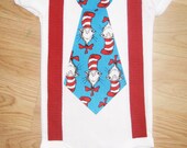 Cat in the hat onesie. Dr Seuss party theme. Cat in the hat tie. Tie and suspenders onesie. Dr Seuss birthday. First birthday outfit