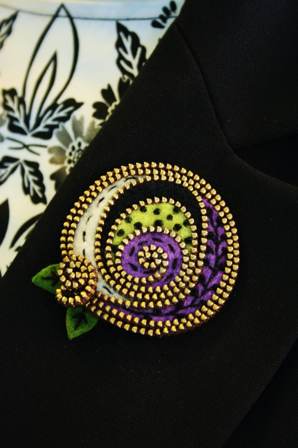 Multi colored abstract felt and zipper brooch
