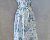 1950s 1960s Vintage Dress by Cay Artley Rayon Crepe. Pastel Floral Print. Blue and Mint. Box Pleats and shoestring belt.  Bust 40