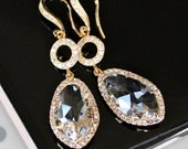 Brilliant Clear Crystals Set with Cubic Zirconia Together with Pave Crystal Links on Crystal Detailed Gold French Earrings