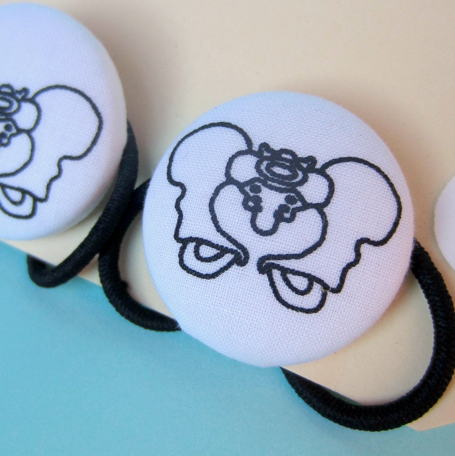 Pelvis Hair Ties on Plain White