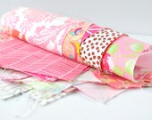 Quilting cotton fabric designer scrap roll pink tones 1