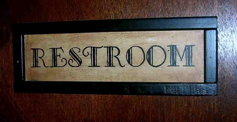 Primitive Restroom Door Sign