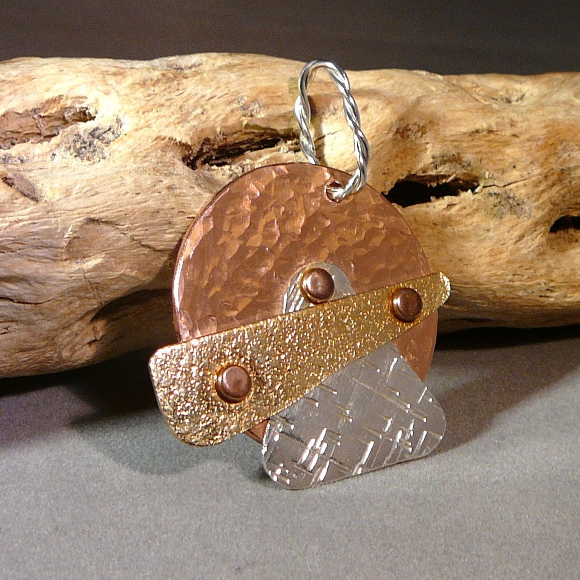 Sterling silver, copper and brass pendant