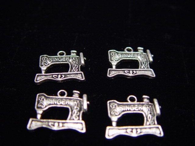 Four Singer Sewing Machine Charms