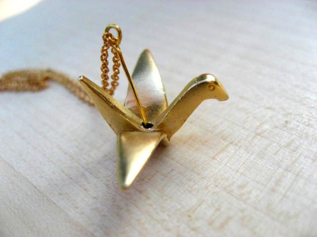 Serenity - A gold origami paper crane necklace