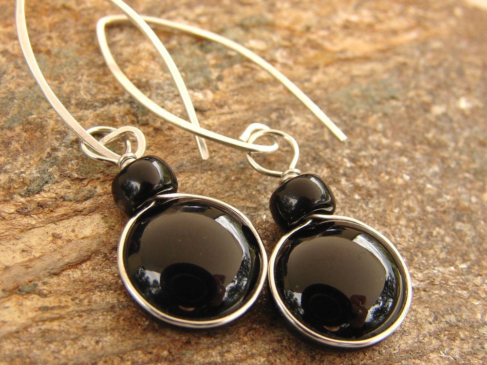 Black glass dangle earrings with sterling ear wires.