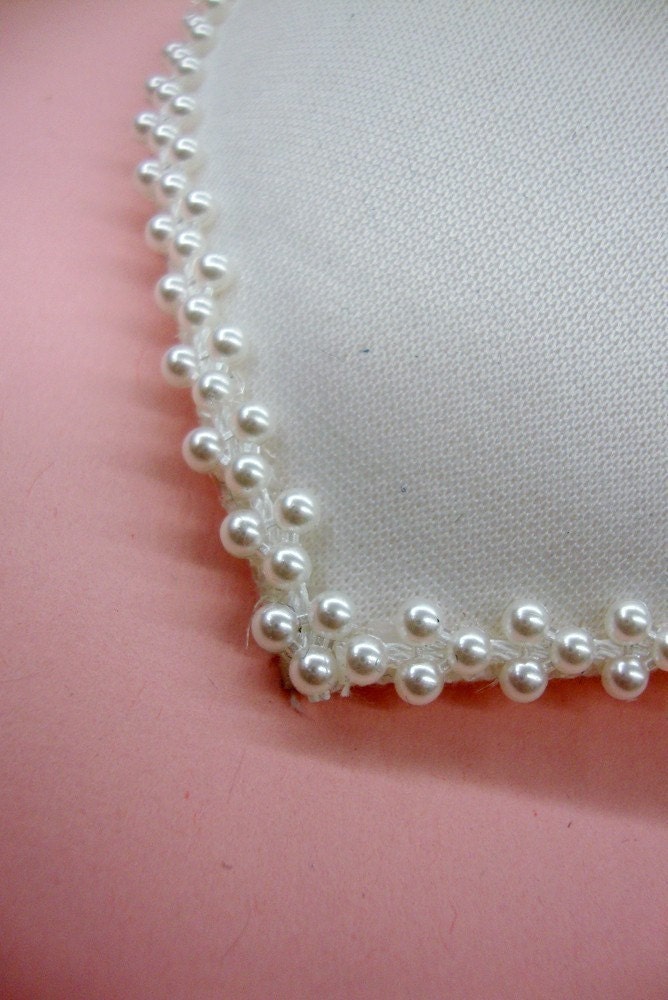 5 inches White Pearl Trimmed Feather Fascinator Base.