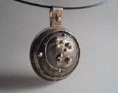 Orbit Brass and Silver Necklace