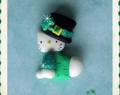 Luck'o the Irish Hello Kitty polymer clay bead/hair bow center/charm
