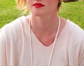 amber briolette and silver on cream jersey
