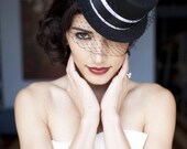 Black veiled mini top hat with black/white ribbon and stunning ostrich feathers
