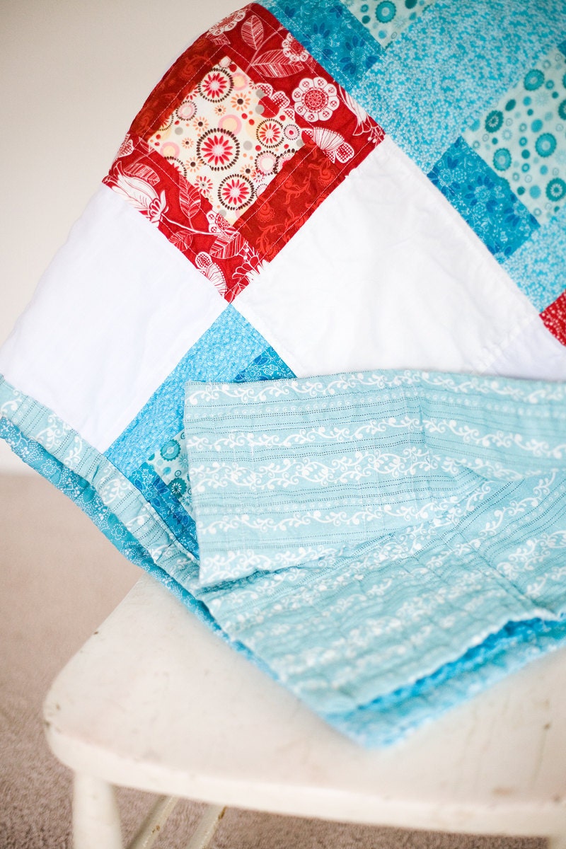 large lap quilt or twin bed topper quilt in red and aqua . price reduced