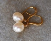 Pearl drop earrings gold cz