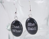 That's What She Said Dangle Glass Earrings. White on Black.