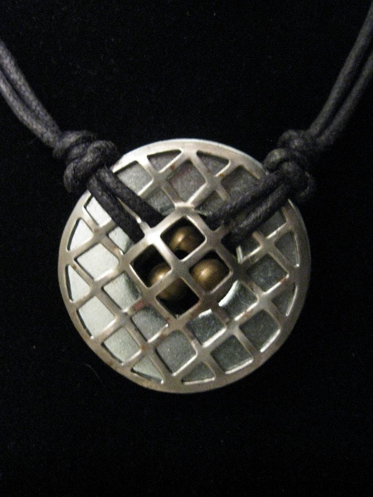 urban artifact necklace - silver cage with stampings, washer, brass beads