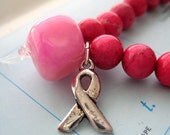 surya pink mala bracelet with breast cancer awareness ribbon