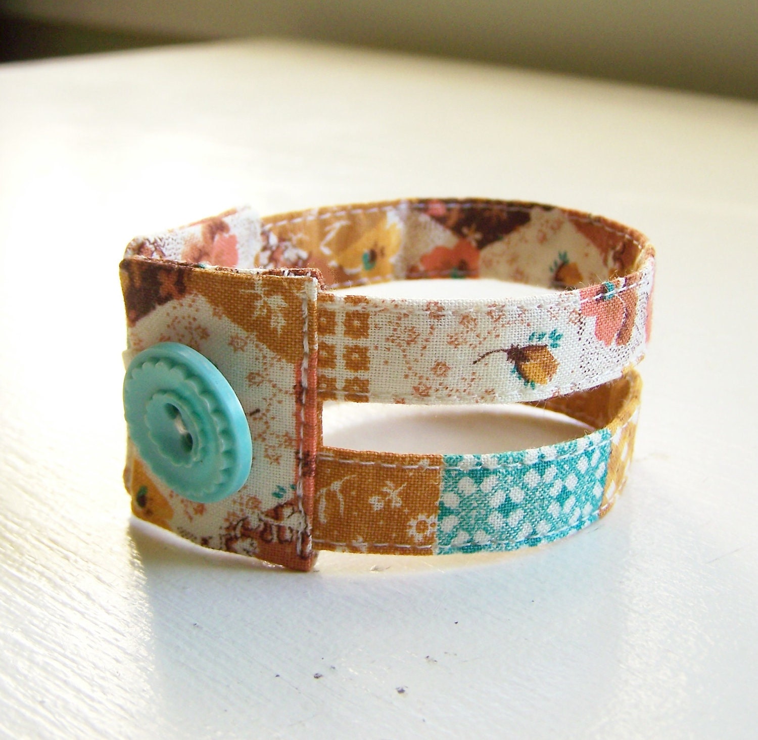 Fabric cuff bracelet in vintage flower girl patchwork
