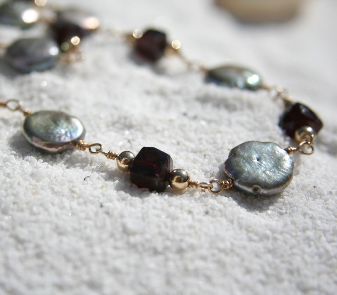 A Necklace of  Gray COIN Pearls,Garnet Cubes and Gold Beads