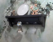 18" Black wooden shelf for knik knack, plates / pegs